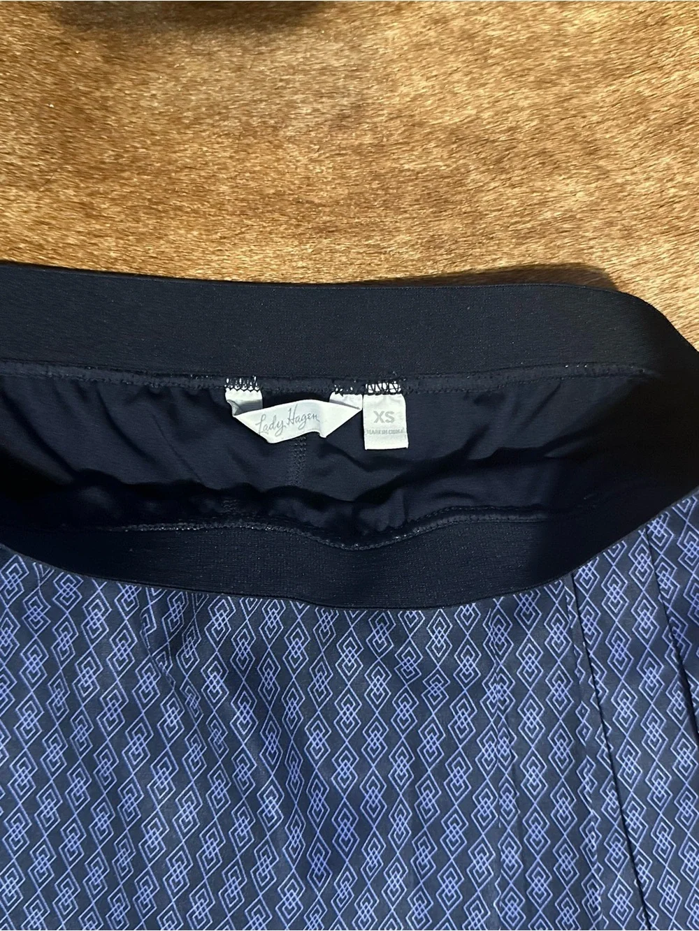Like new golf set Sleeveless Polo with matching skirt Navy and Light Blue Trim